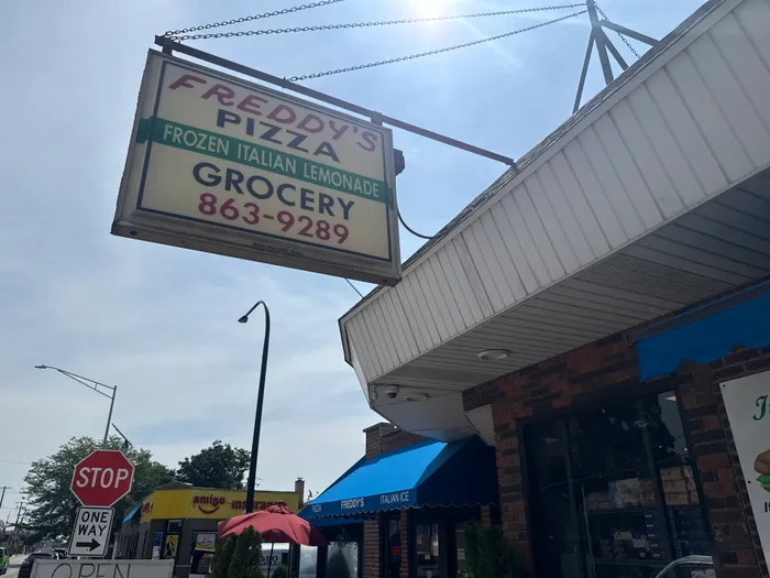 Freddy's Pizza and Italian Lemonade vintage corner sign in Cicero