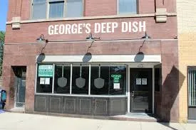 George's Deep Dish storefront on North Clark Street in Edgewater, with the name painted across the brick facade