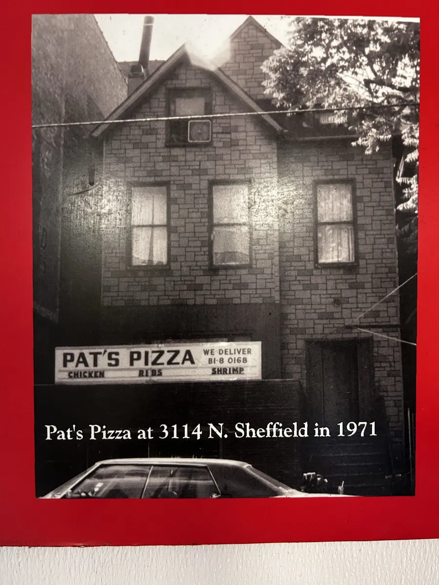 A framed photo of Pat's Pizza at 3114 N Sheffield as it looked in 1971