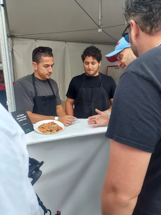 The Pompei crew serving at their Pizza City Fest booth